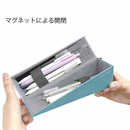 A picture of a person opening The Black Tray Tray Pen Case with pens inside it