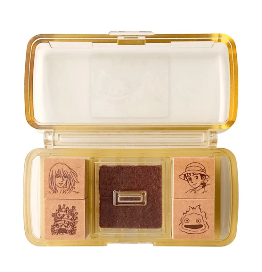 Howl's Moving Castle stamps in opened plastic case with inkpad in the middle